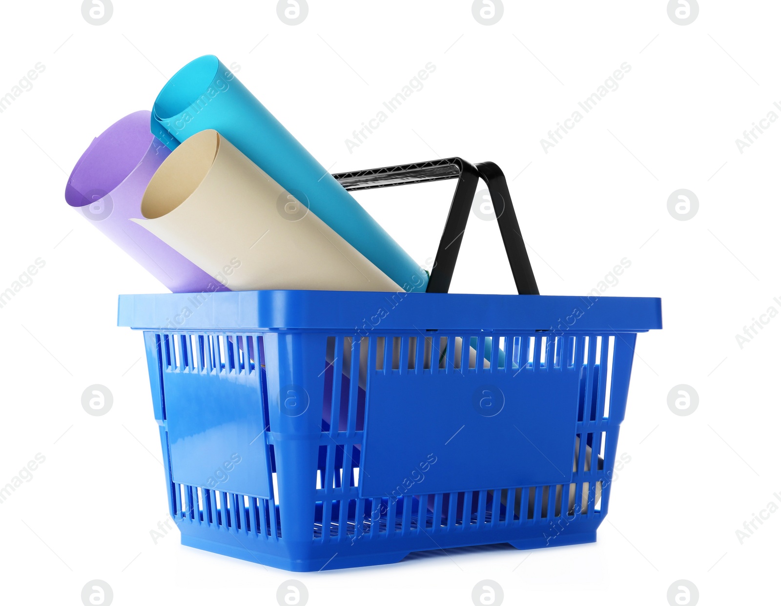 Photo of Color plastic shopping basket with rolls of paper isolated on white