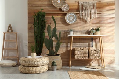 Room interior with stylish decor and console table