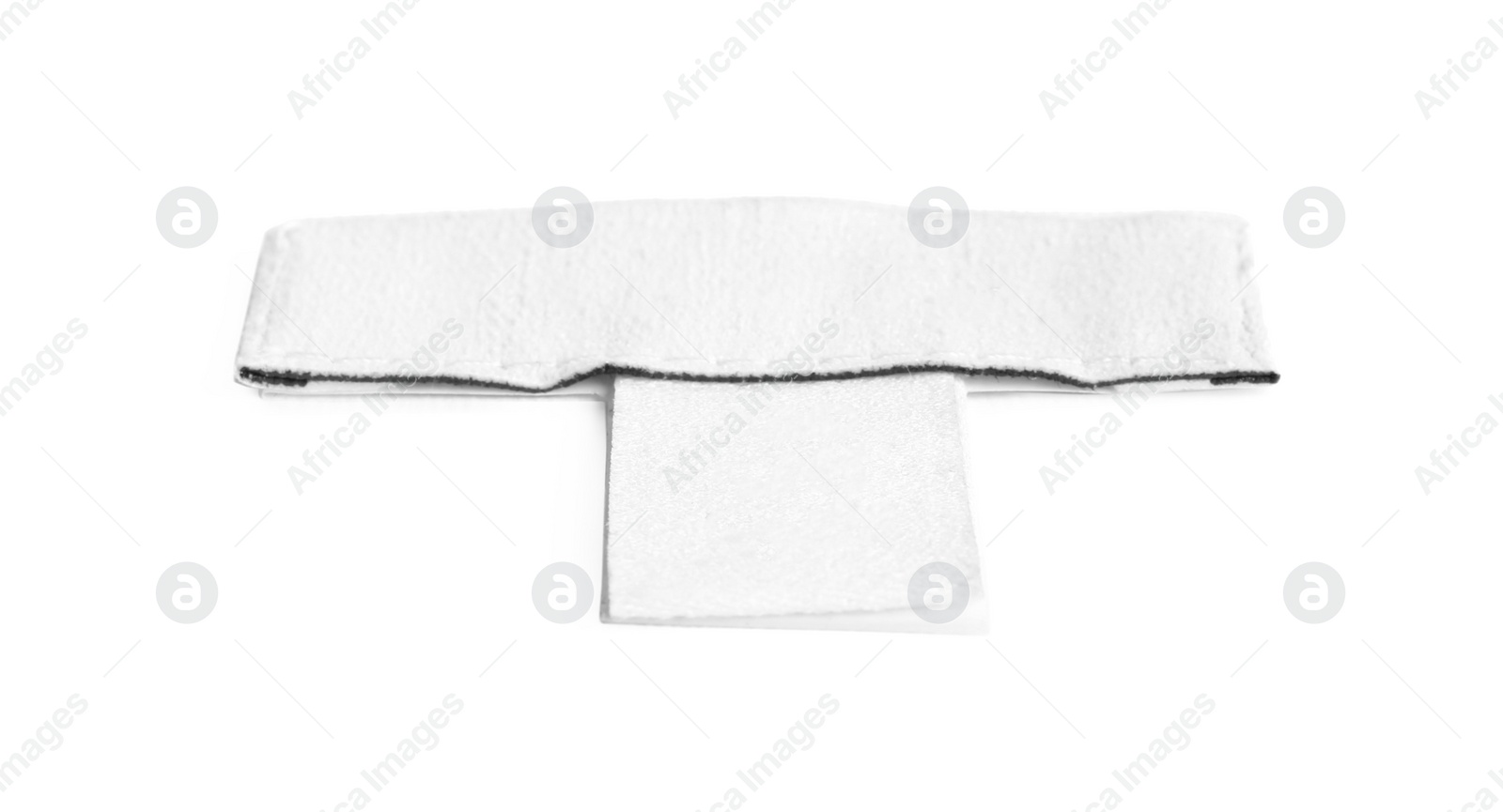 Photo of Blank stylish clothing label isolated on white