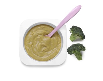 Container with healthy baby food, spoon and broccoli isolated on white, top view