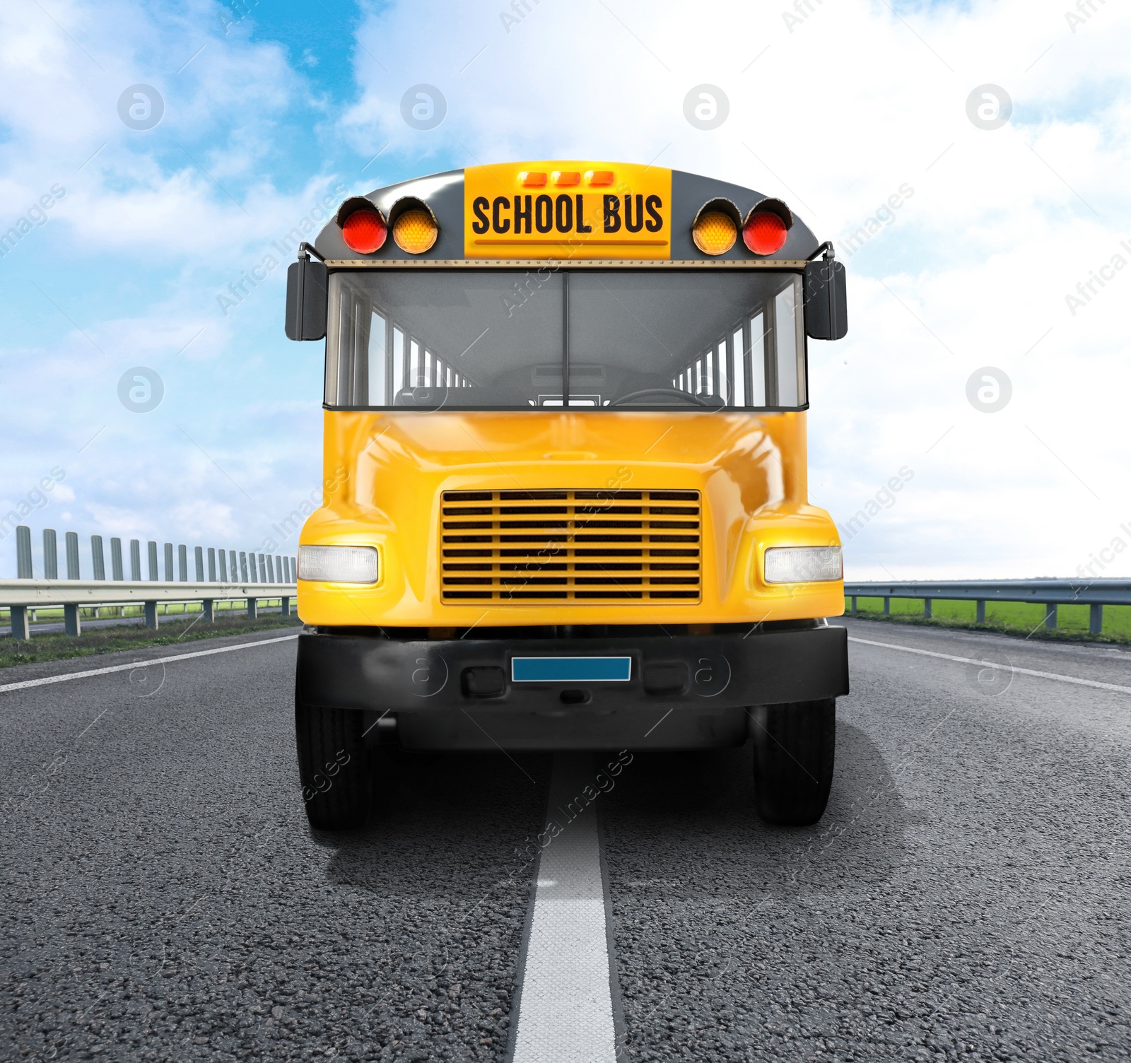 Image of Yellow school bus on road outdoors. Transport for students