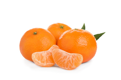 Photo of Fresh juicy tangerines with green leaves isolated on white