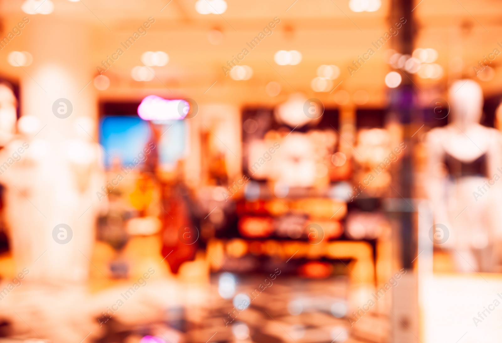 Photo of Blurred view of clothing store, bokeh effect