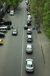 Cars in traffic jam on city street, aerial view