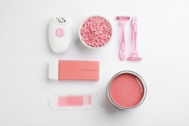 Photo of Set of epilation products on light background, flat lay