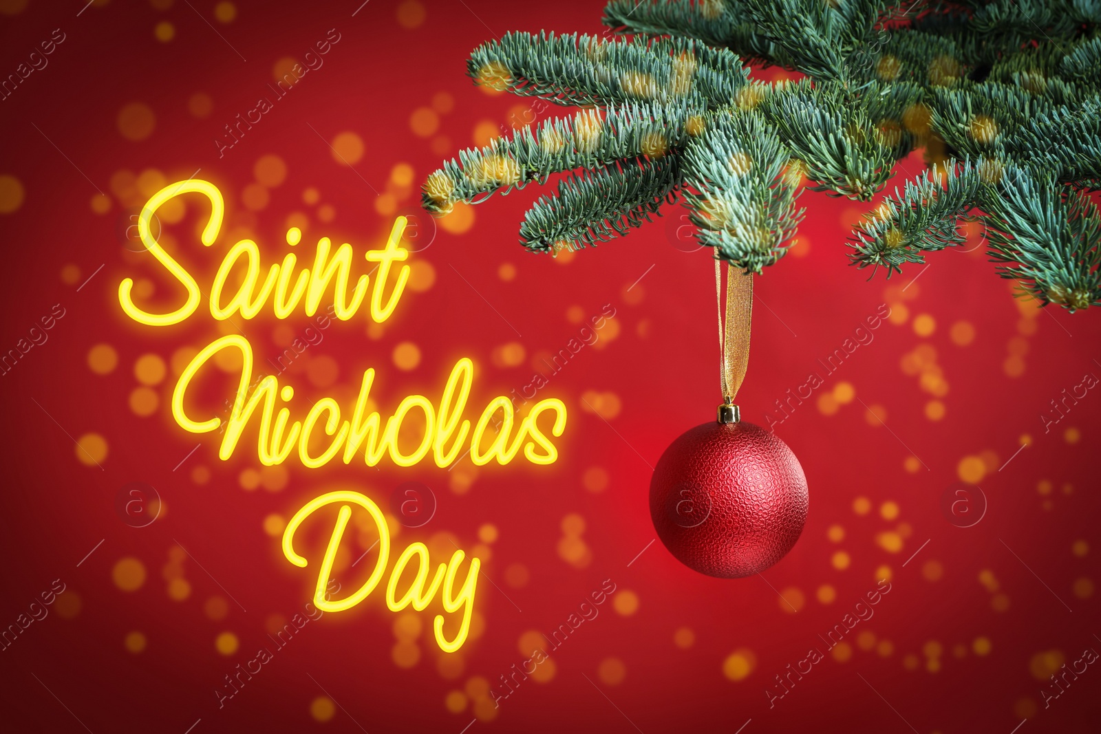 Image of Saint Nicholas Day. Beautiful Christmas ball hanging on fir tree branch against red background, bokeh effect