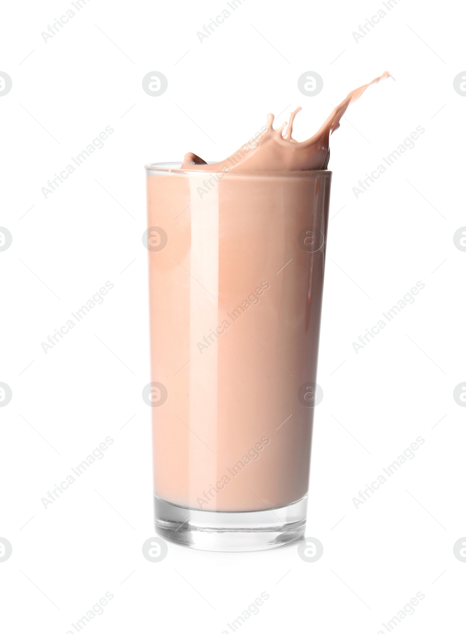 Photo of Glass with splashing chocolate milk on white background. Dairy drink