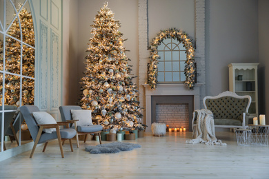 Photo of Festive room interior with beautiful Christmas tree