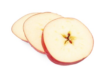 Photo of Slices of ripe red apple isolated on white