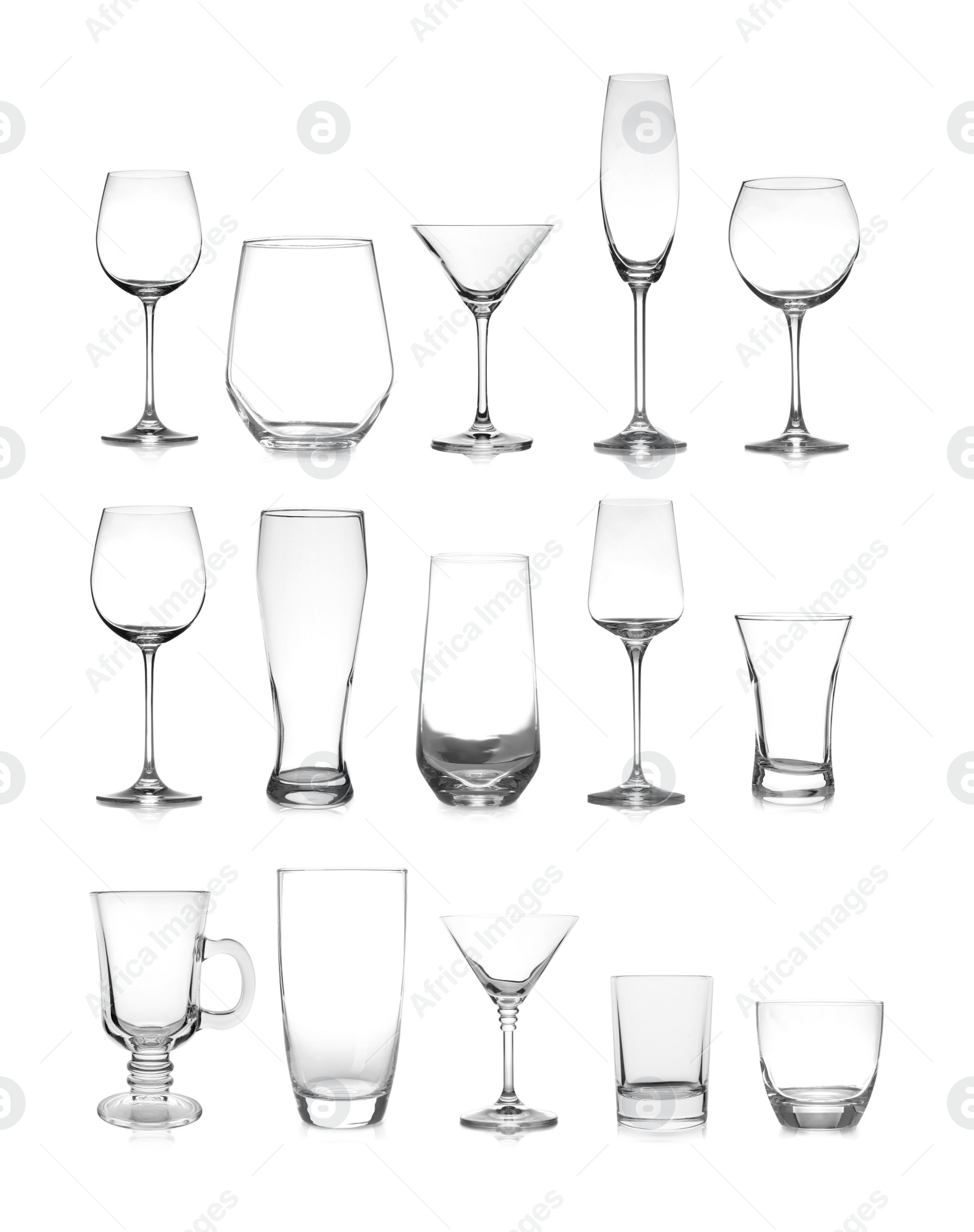 Image of Set of different empty glasses on white background