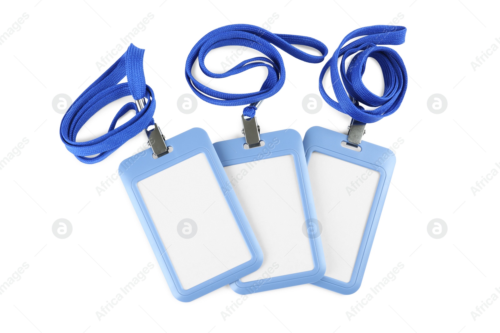 Photo of Blank badges on white background. Mockup for design