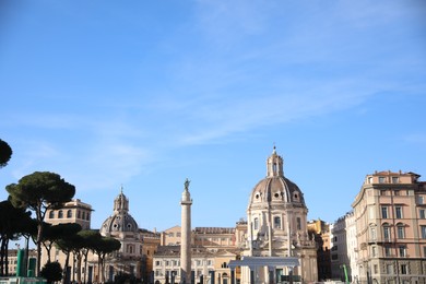 Rome, Italy - February 4, 2024 : Church of Most Holy Name of Mary and Trajan's Column outdoors