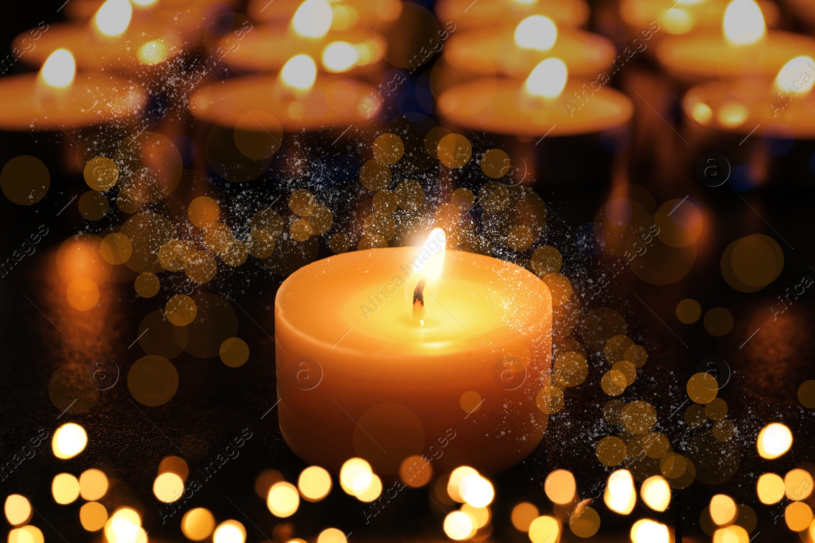 Image of Burning candles on dark background, bokeh effect