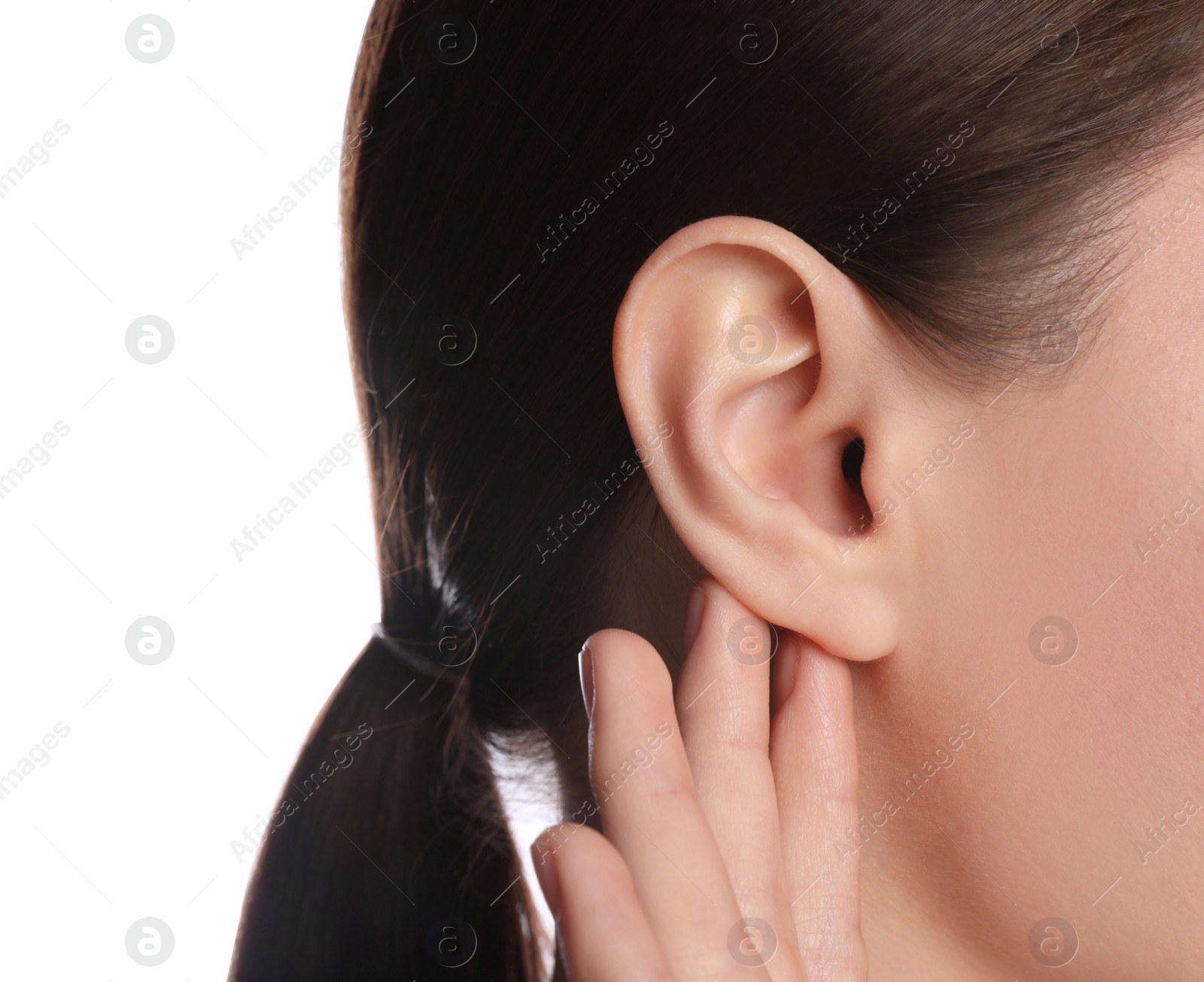 Photo of Woman showing hand to ear gesture on white background, closeup