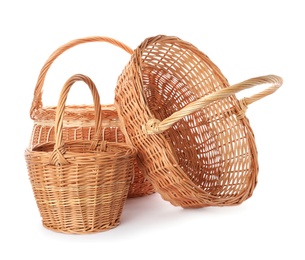 Three decorative wicker baskets on white background