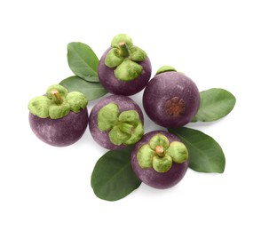 Fresh mangosteen fruits with green leaves on white background, top view