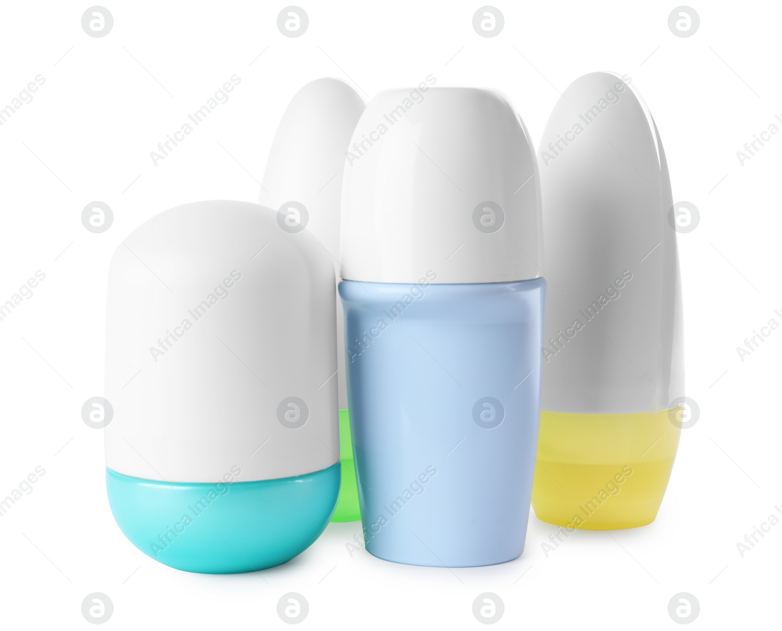 Photo of Different female roll-on deodorants on white background. Skin care