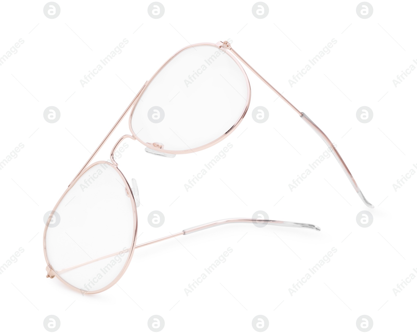 Photo of Stylish glasses with metal frame isolated on white