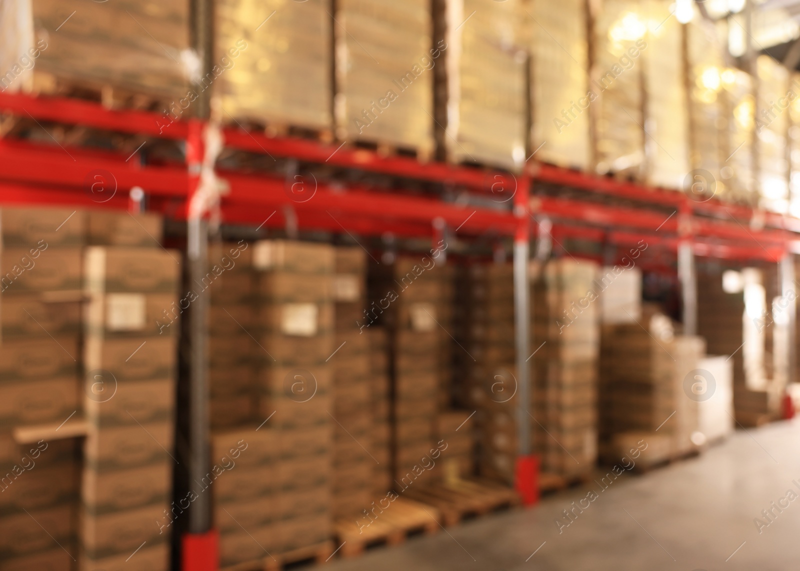 Image of Warehouse with lots of products, blurred view. Wholesale business