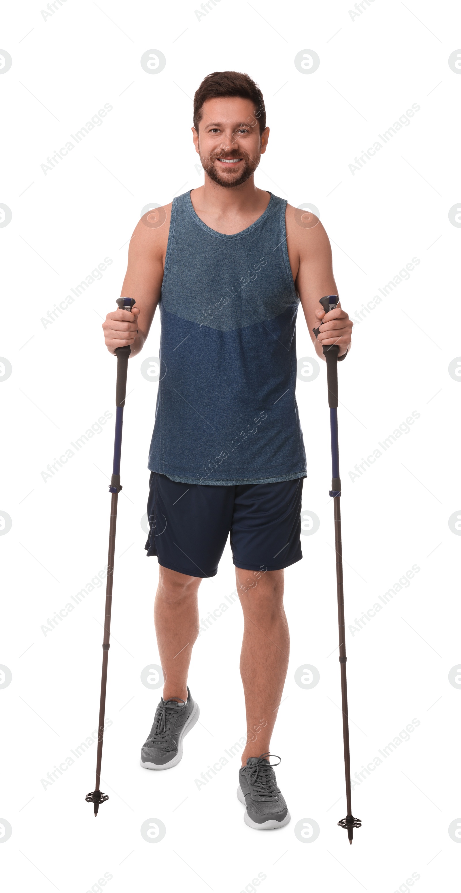 Photo of Man practicing Nordic walking with poles isolated on white