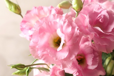 Photo of Beautiful bouquet of Eustoma flowers, close up view