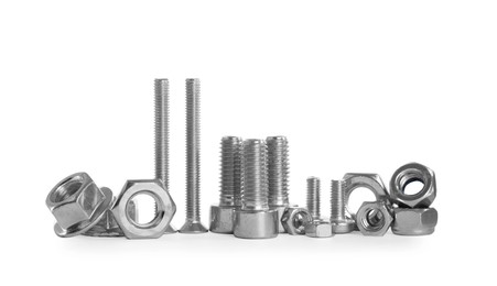 Photo of Different metal bolts and nuts on white background