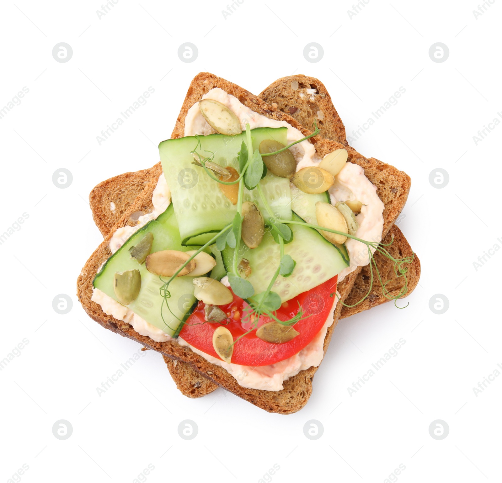 Photo of Tasty vegan sandwich with cucumber, tomato and pumpkin seeds isolated on white, top view