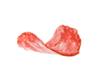 Slice of tasty salami on white background