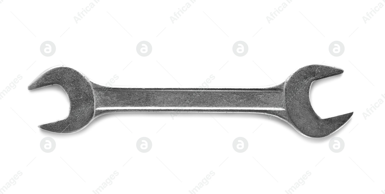 Photo of New wrench on white background, top view. Plumber tools