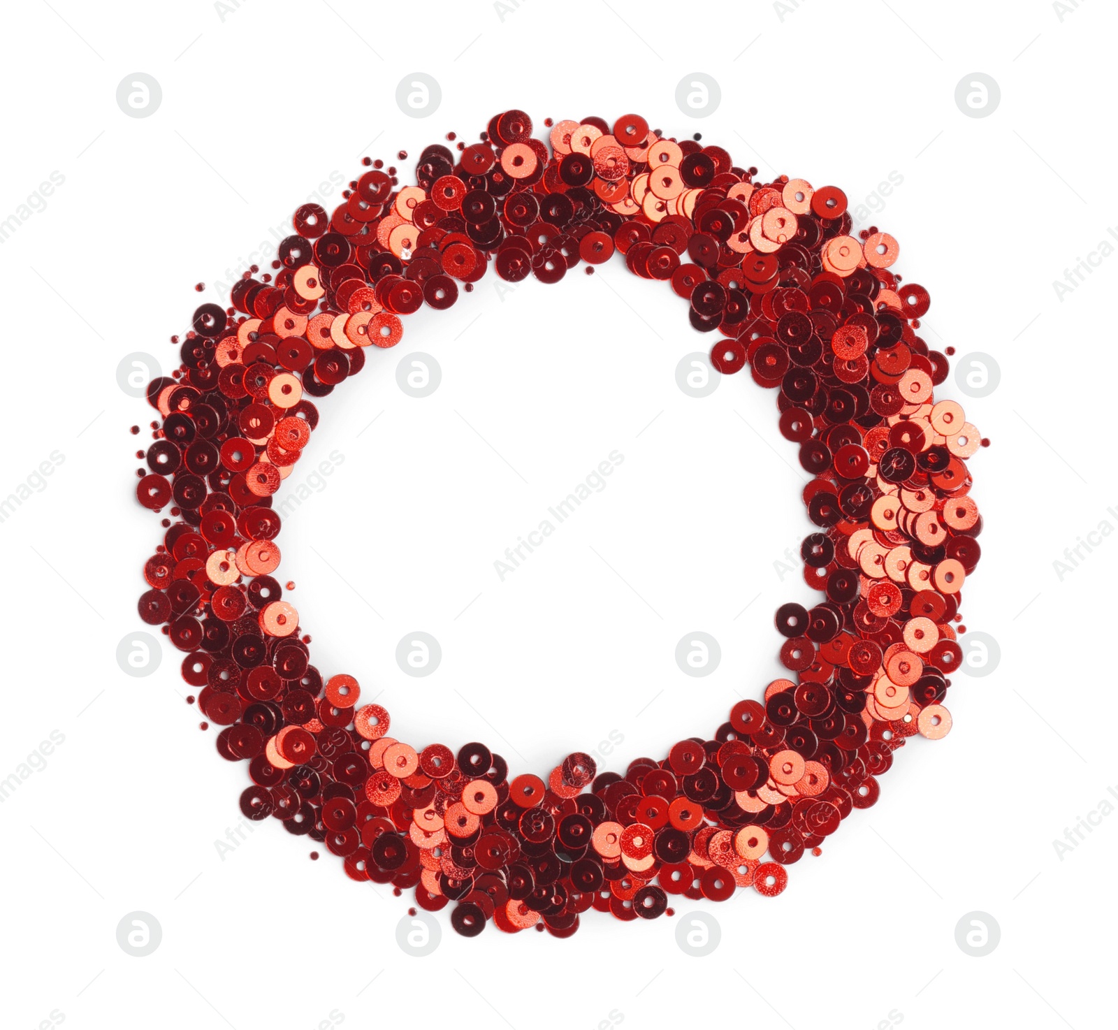 Photo of Pile of red sequins isolated on white, top view