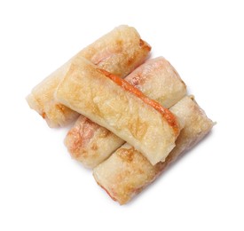 Photo of Delicious fried spring rolls isolated on white, top view