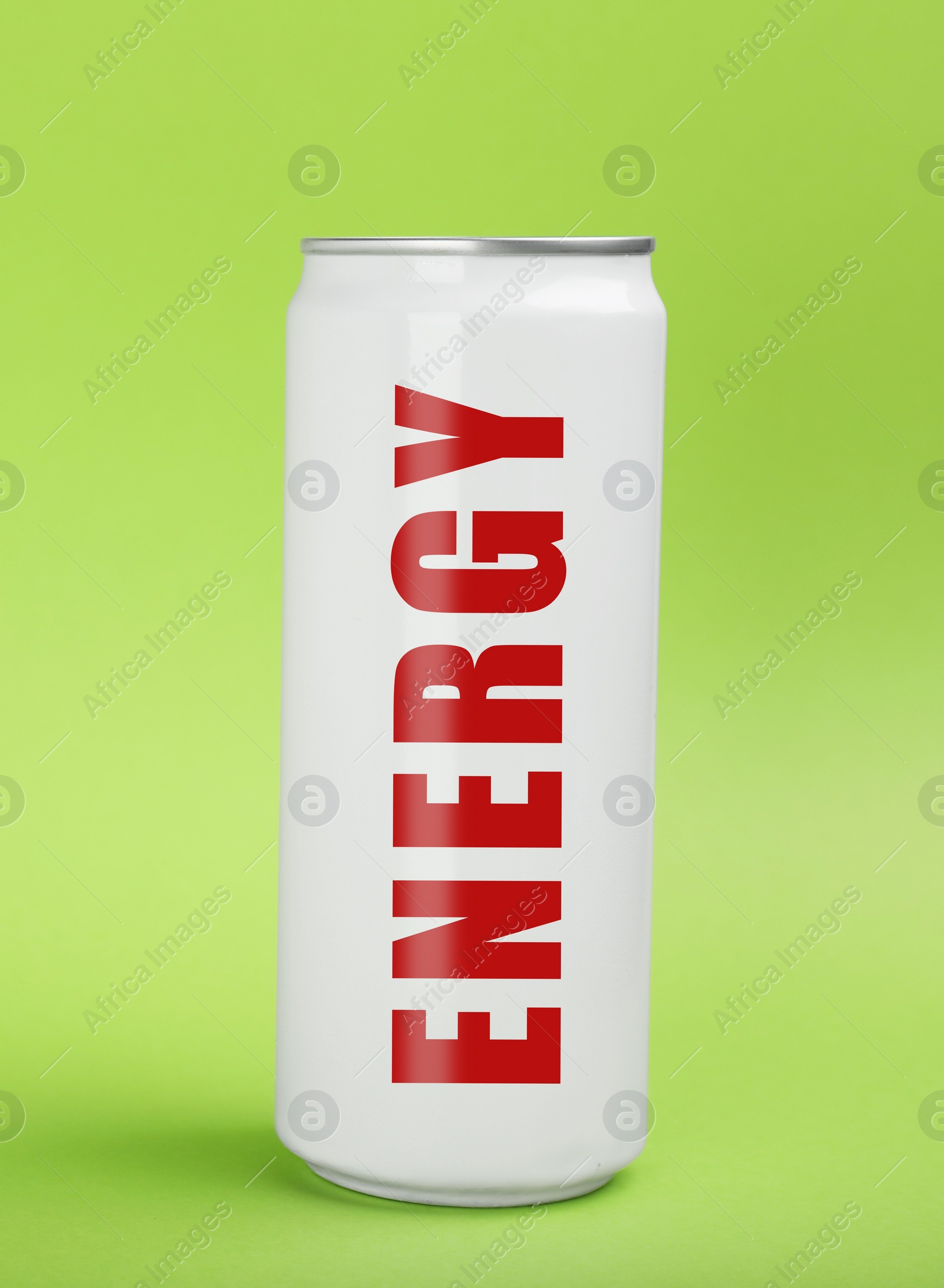 Image of Can of energy drink on light green background