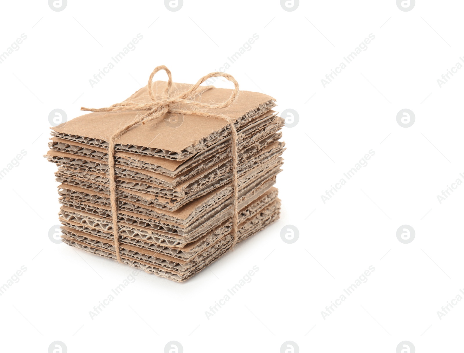 Photo of Stack of cardboard pieces on white background. Recyclable material