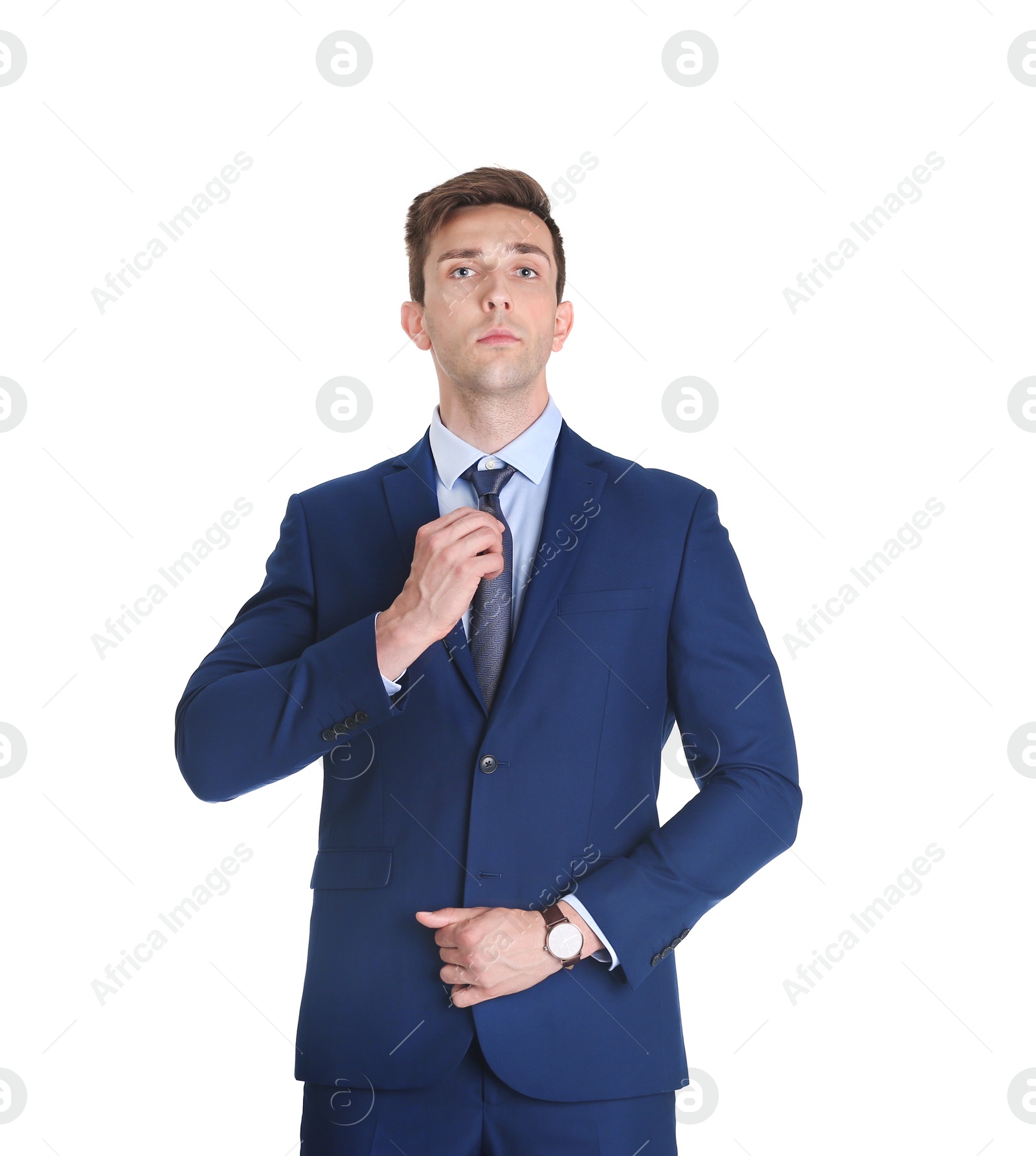 Photo of Handsome young man in suit on white background