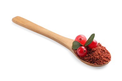 Photo of Wooden spoon with dried cranberry powder, fresh berries and green leaves isolated on white