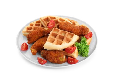 Photo of Plate with tasty Belgian waffles, fried chicken, tomatoes and lettuce isolated on white