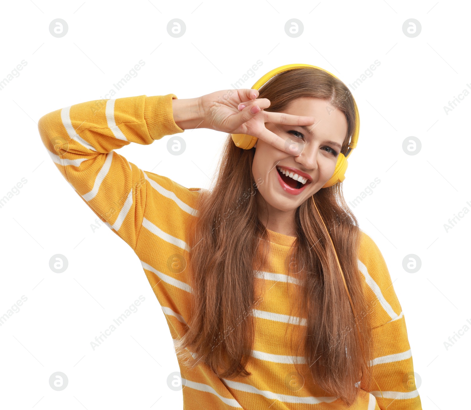 Photo of Young woman listening to music with headphones on white background