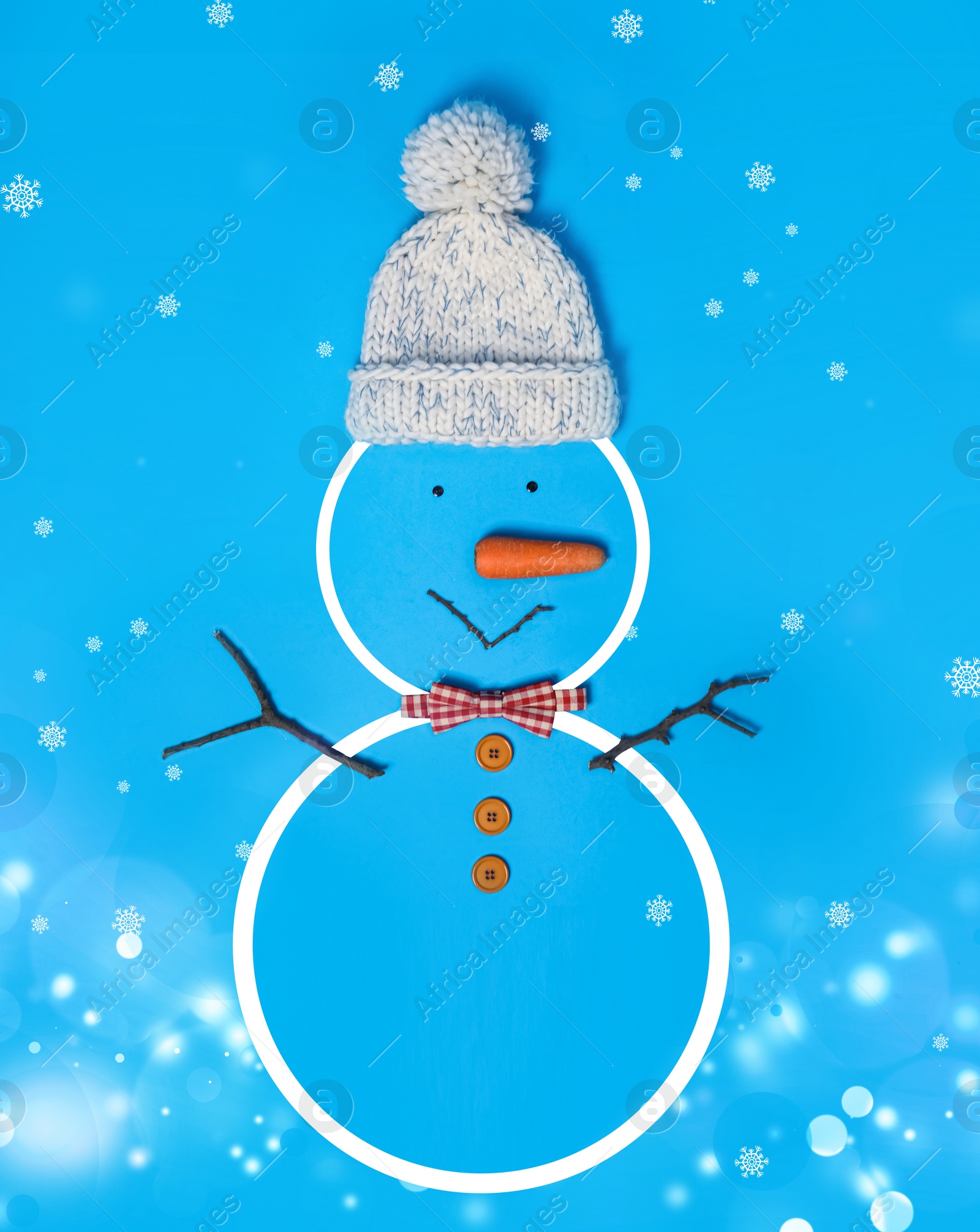 Image of Snowman with hat and bow tie on light blue background, flat lay. Bokeh effect 