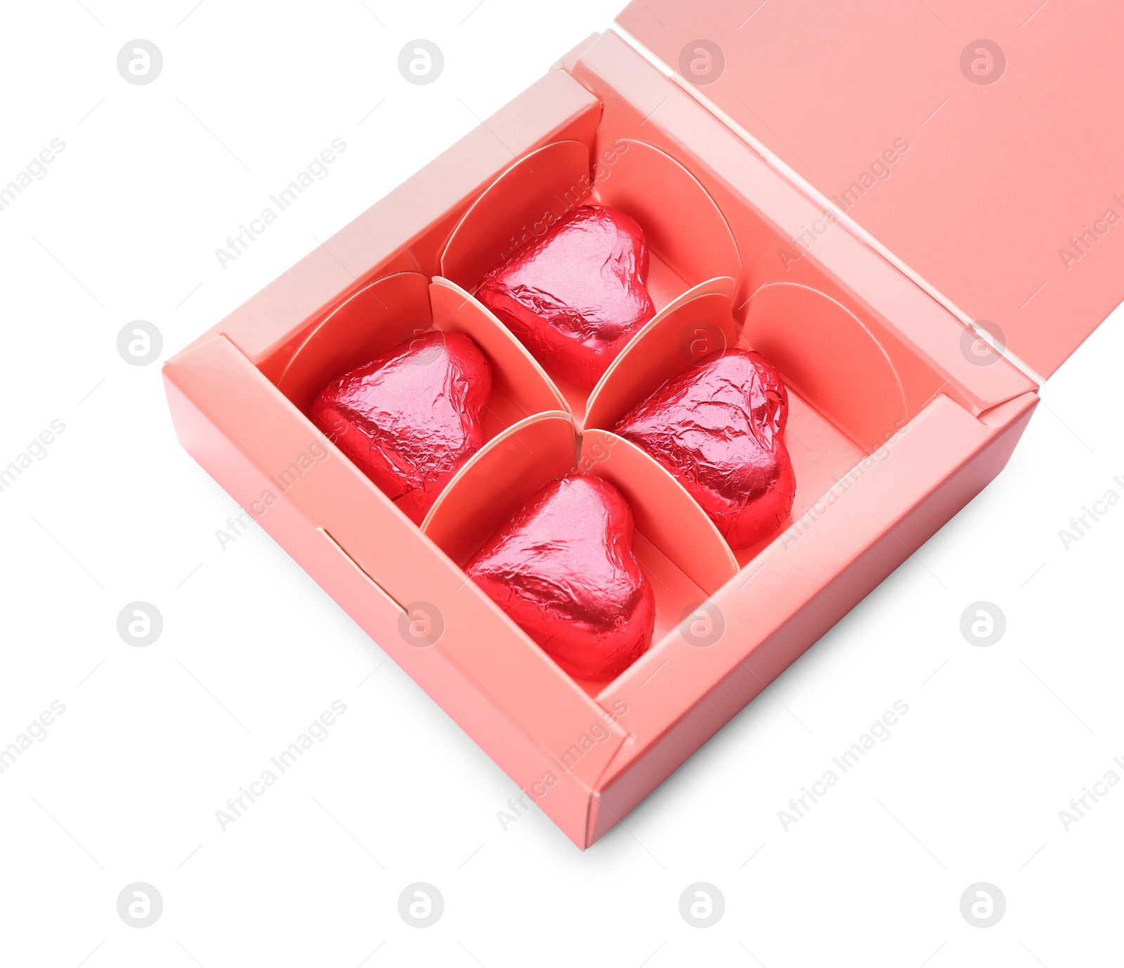Photo of Heart shaped chocolate candies in box on white background