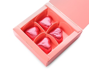 Photo of Heart shaped chocolate candies in box on white background