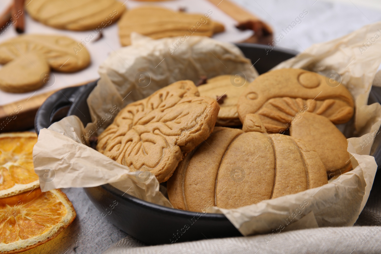 Photo of Different tasty cookies in baking dish, closeup