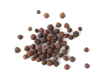 Photo of Black pepper grains on white background, top view