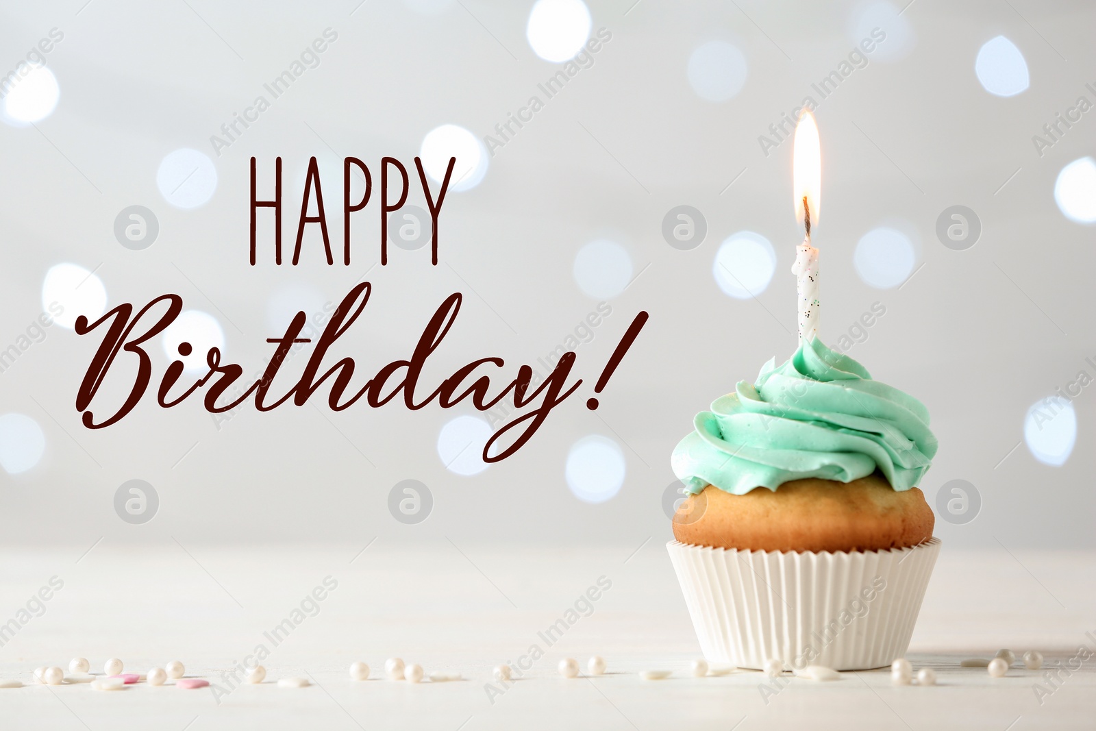 Image of Happy Birthday! Delicious cupcake with burning candle on light background