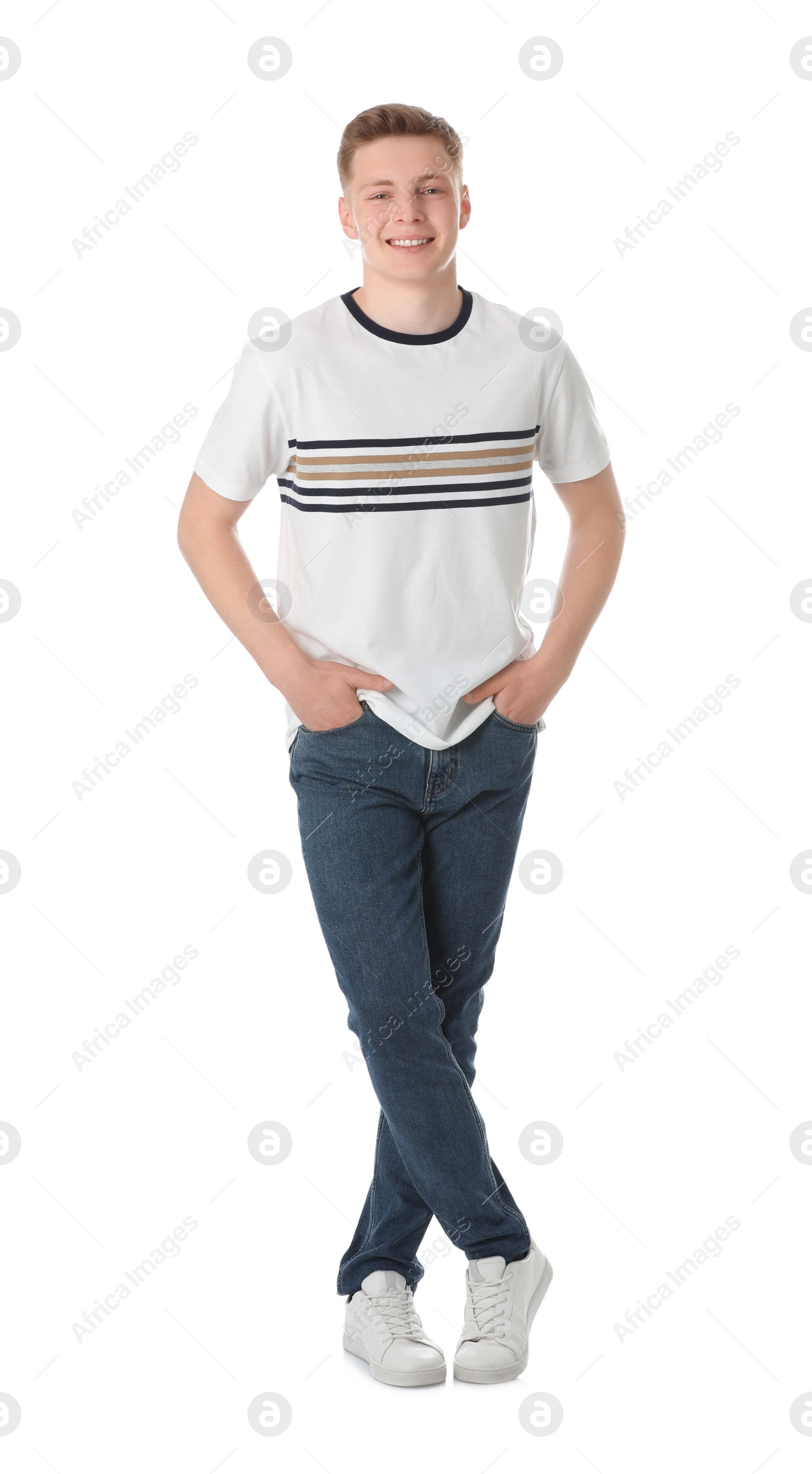 Photo of Full length portrait of happy teenage boy on white background