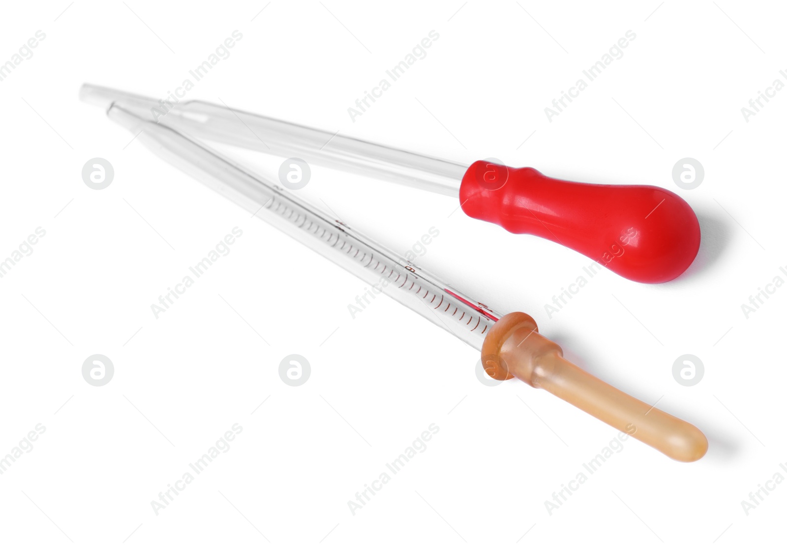 Photo of Two glass clean pipettes isolated on white