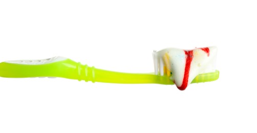 Photo of Brush and toothpaste foam with blood on white background. Gum problems