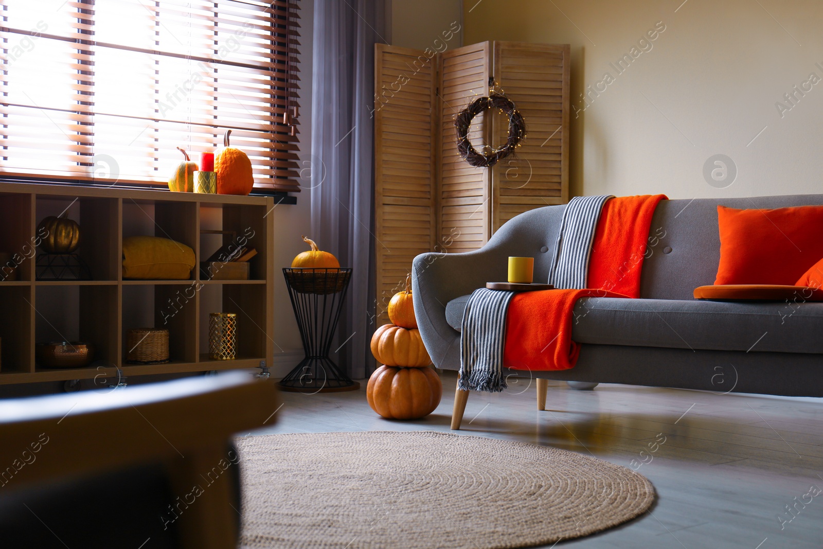 Photo of Cozy living room interior inspired by autumn colors