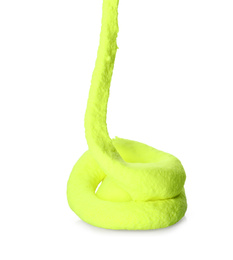 Photo of Flowing yellow slime on white background. Antistress toy