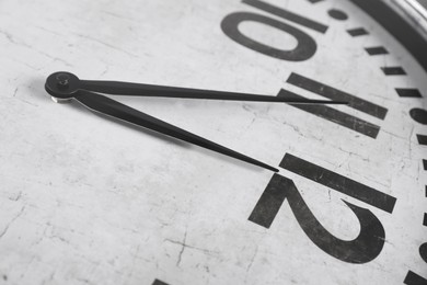 Photo of Closeup view of stylish analog clock. New Year countdown