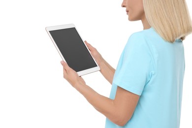 Woman holding tablet with blank screen on white background, closeup. Mockup for design